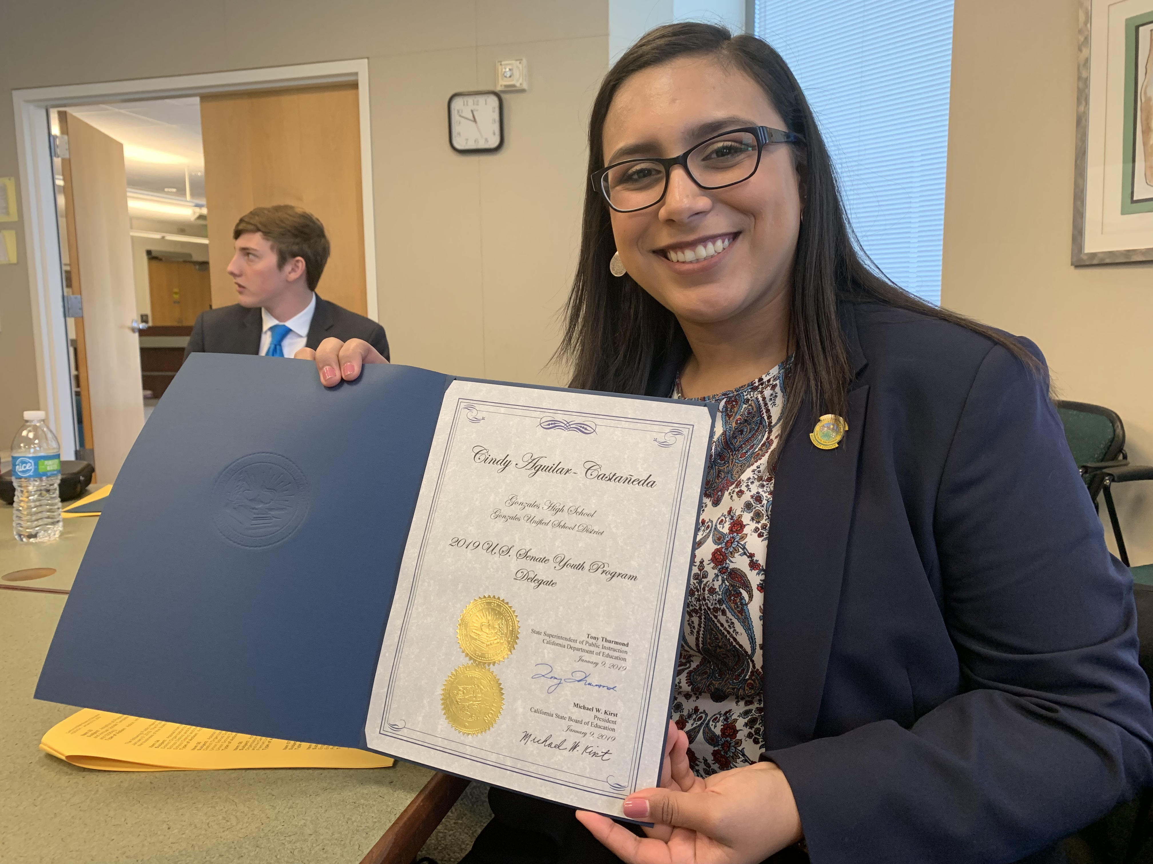 Cindy Aguilar with certificate