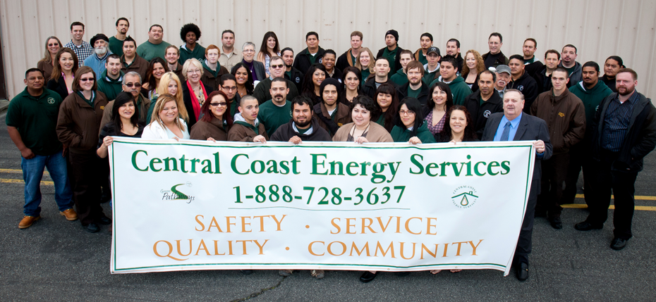Photo: Central Coast Energy Services team holding banner