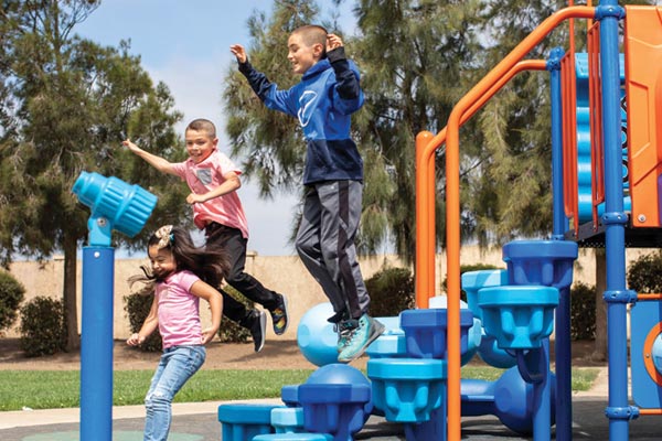 Gonzales Children on Playground