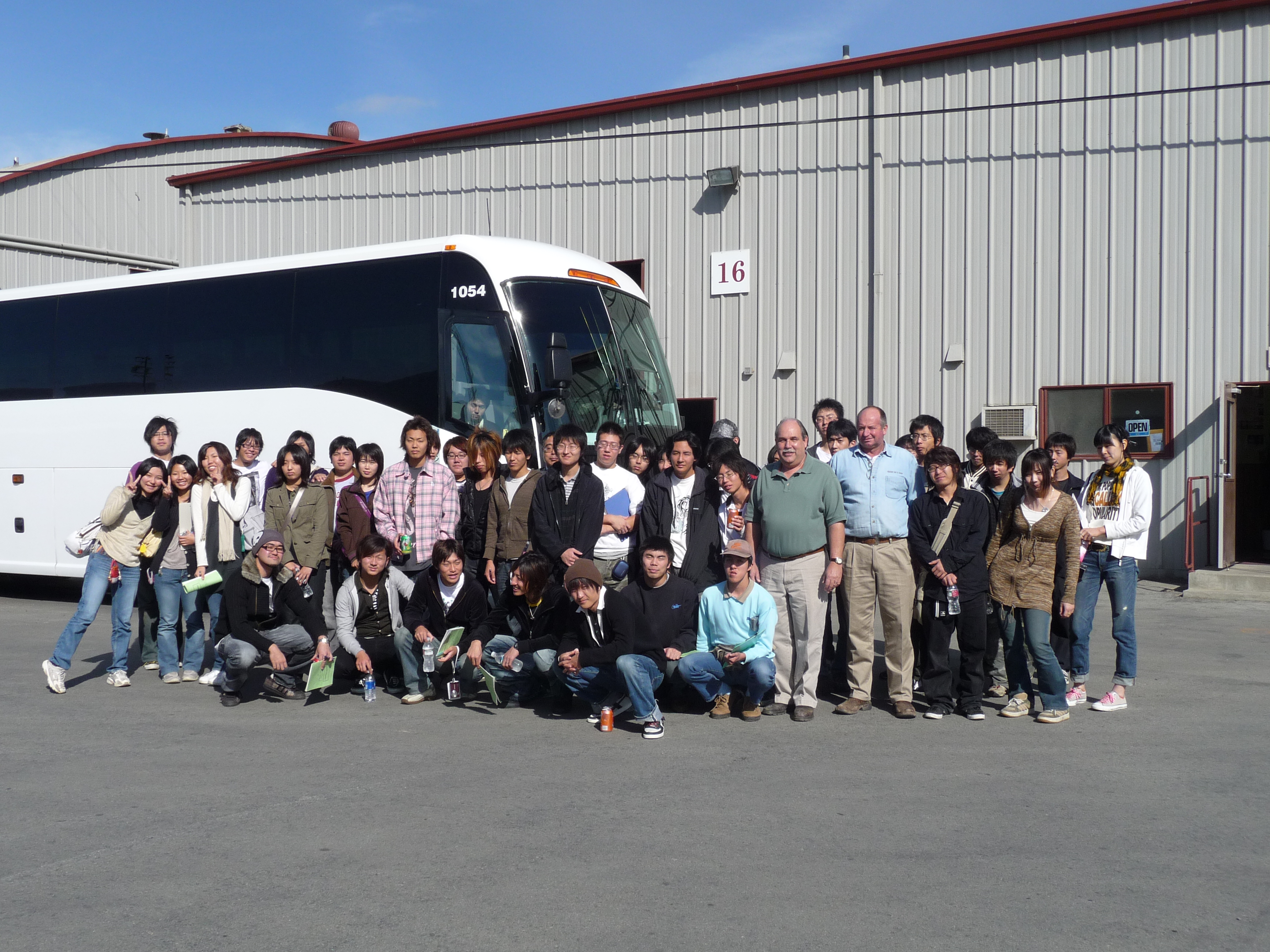 Bus of Japanese agricultural businessmen visiting Healthy Soil in Gonzales