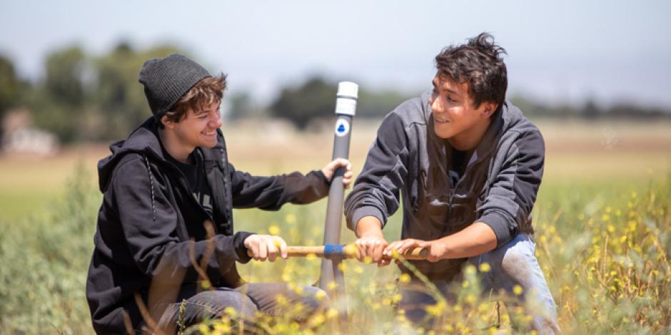 Two Gonzales Youth in Field