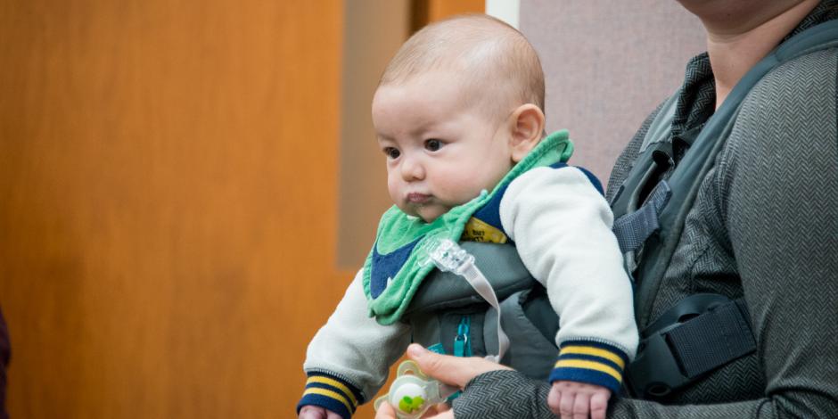 Baby boy in mother's arms