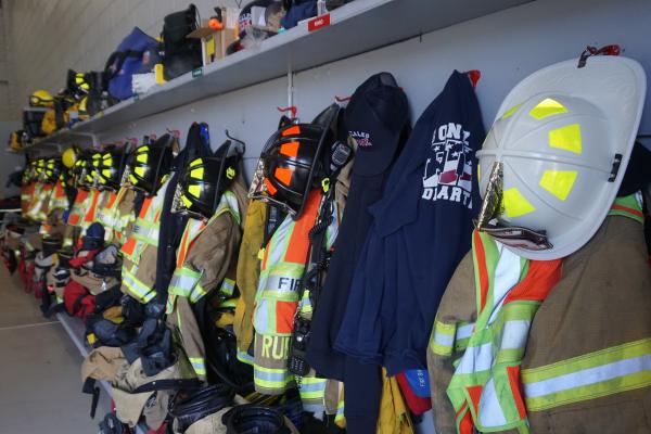 Photo of Fire Department helmets and jackets