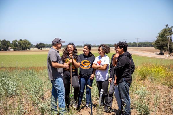 Photo: Wings of Knowledge Youth Program Participants in the fiel